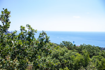 Black Sea view from the mountain. Light sunny summer day, Crimea, Russia.
