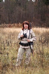 Woman with shotgun
