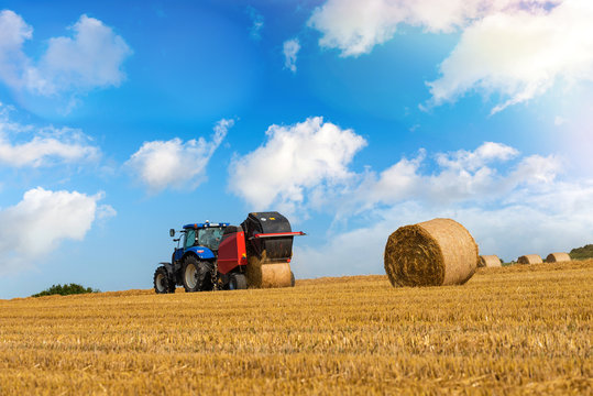 farmer preparing straw millstones after harvest
