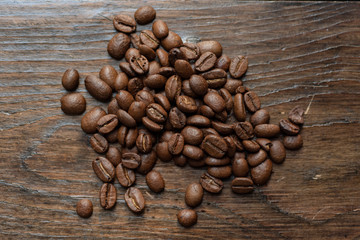 coffee beans on wooden background