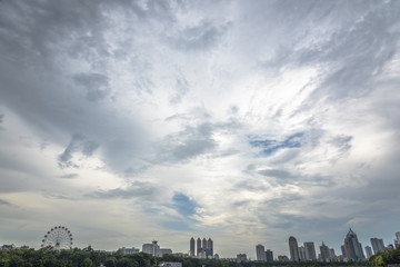 Naklejka premium Urban building high-rise and sky cloud landscape
