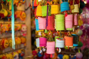 Fototapeta na wymiar Colorful tradition lantern at chinatown lantern market in saigon, Vietnam. Beautiful Chinese lanterns and Many kind of tradition lanterns hanging on street market in mid autumn festival. 