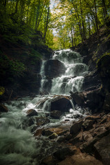 Rapid waterfall  in the Carpathian Mountains