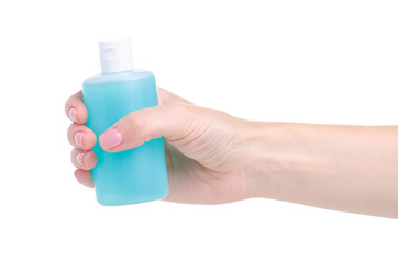 Bottle acetone nail polish remover in hand on white background isolation