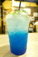 Blue Hawaii Cocktail in plastic glass