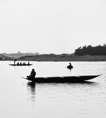 silhouette of fishermen in boat