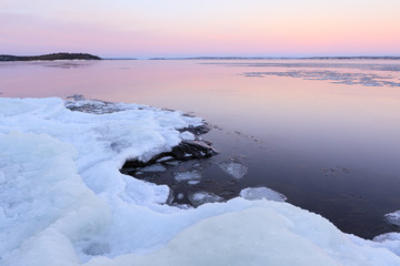 Lake scenery at dusk winter in Finland