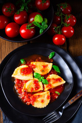 ravioli alla genovese with basil tomato sauce