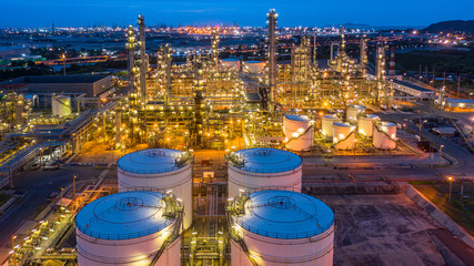 Aerial view petrochemical plant and oil refinery plant background at night,  Petrochemical oil refinery factory plant at night. - obrazy, fototapety, plakaty