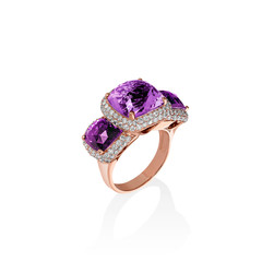 Fototapeta premium Rose gold ring with purple saphires and multiple diamonds, cushion cut gems