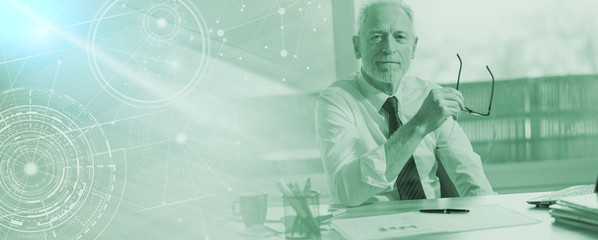 Portrait of mature businessman; multiple exposure