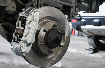 New car brake system replacement, brake disc, brake caliper.