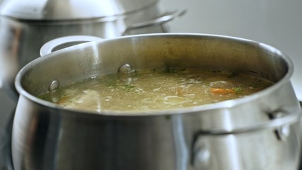 Steam coming off a hot pot on the stove