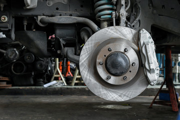 New car brake system replacement, brake disc, brake caliper. - obrazy, fototapety, plakaty