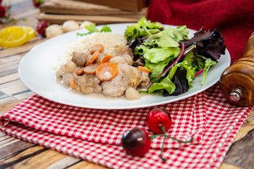 Cooked White Veal Stew and rice