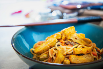 wok chicken with soy sauce noodles and vegetables