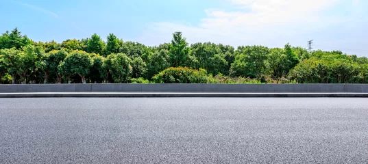 Fotobehang Bleke violet Asphalt highway and green forest with beautiful clouds landscape  © ABCDstock