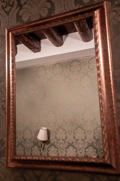 Venice Tipical Interior Of A Hotel Looking At Lamp Through The Mirror