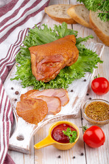  smoked chicken legs with fresh vegetables and seasonings