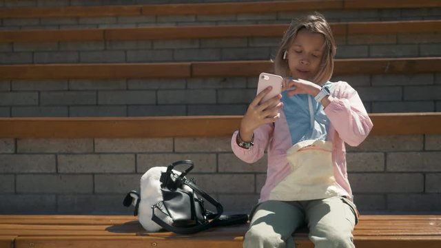 happy children back to school and making selfie. selfie of happy girl cheerful students. pretty little girls. school day of little girls