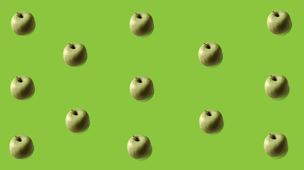 apples on green background