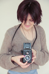 young girl with a camera