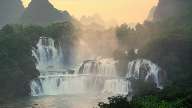 Sunrise bird eye view Bangioc waterfall in Vietnam and Detian waterfall in China, located near border, people can see this waterfall both of country, Lockdown..