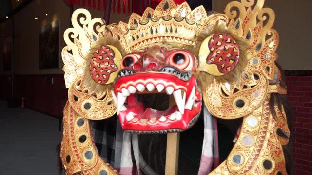 Barong - balinese symbol of mythology and dance. Mask of lion head -  king of the spirits. Located in Garuda Wisnu park at Bukit, Bali.