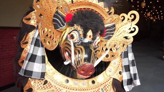 Barong - balinese symbol of mythology and dance. Mask of lion head -  king of the spirits. Located in Garuda Wisnu park at Bukit, Bali.