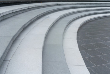 Large arched stairs made from granite.