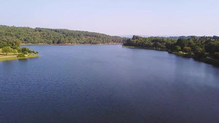 FLYING OVER A DAM SUNNY DAY