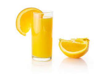 One glass of fresh sweet orange juice with a slice and a quarter of orange aside isolated on white background