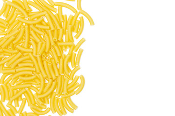 Lot of whole raw pasta macaroni copyspace on right flatlay isolated on white background