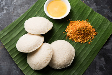 Fototapeta na wymiar Podi idli is a quick and easy snack made with leftover idly. served with sambar and coconut chutney. selective focus