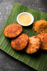 Podi idli is a quick and easy snack made with leftover idly. served with sambar and coconut chutney. selective focus