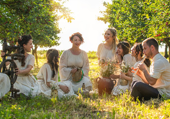 Young people in folk clothes