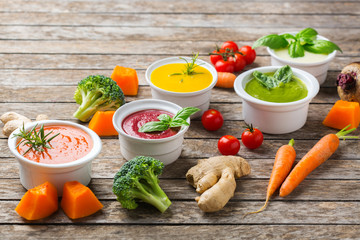 Set of seasonal fall autumn creamy soups on a table