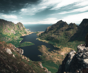 view from the top of mountain. lake next to the sea and mountains