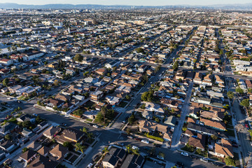 Afternoon aerial view of middle class homes and streets in Los Angeles County, California.  