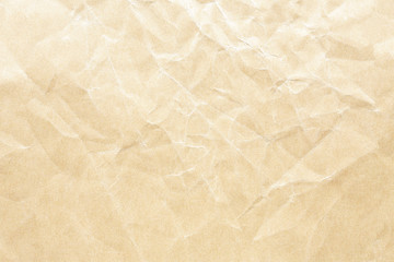 Old pale yellow crumpled paper background texture