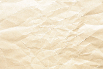 Old pale yellow crumpled paper background texture