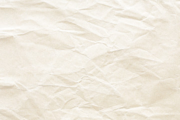 Old pale yellow crumpled paper background texture