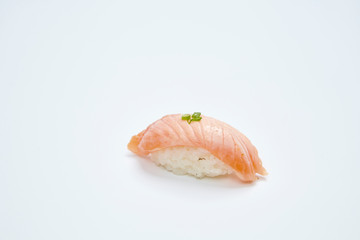 Salmon Sushi on white background in closeup