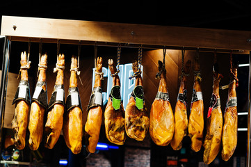 Traditional spanish jamon ham for sale at supermarket.