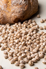 A lot of chickpeas and bread on the table