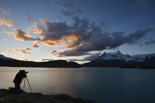 Photographer at the Torres del Paine mountains, Lago Pehoe, National Park Torres del Paine, Patagonia, Chile, South America