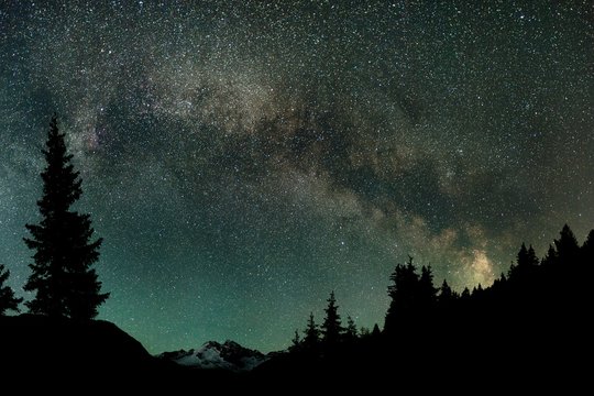 Milky Way over Mount Olperer, forested mountains, Zillertal Alps, Valstal, Tyrol, Austria, Europe