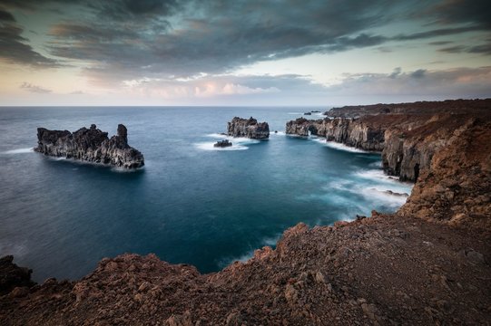 Puntas de Gutierrez, rocky lava coast Punta de la Dehesa, dusk, dramatic sky, El Hierro, Canary Islands, Spain, Europe