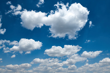 Bright beautiful blue sky with clouds for background or texture