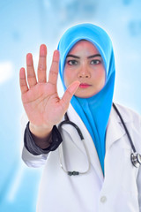 Doctor over blue clinic background. Medical and Healthcare Concept.